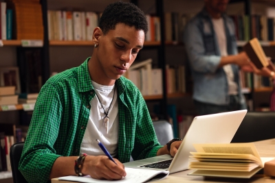 Photo of male college student studying