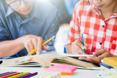 Photo of two students studying