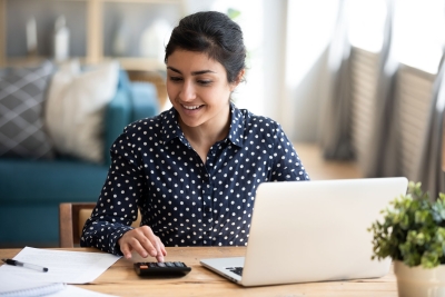 Female student using a calculator