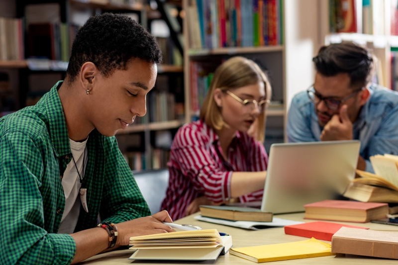 College students sitting at the library