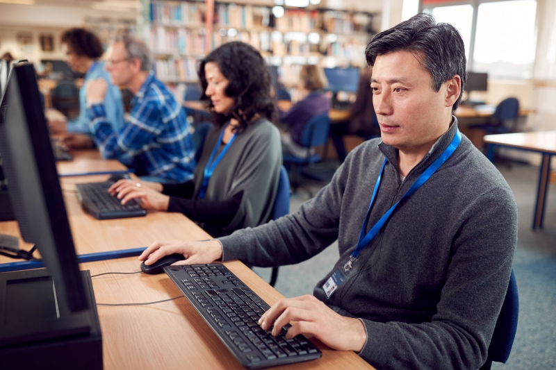 Male adult student in classroom.